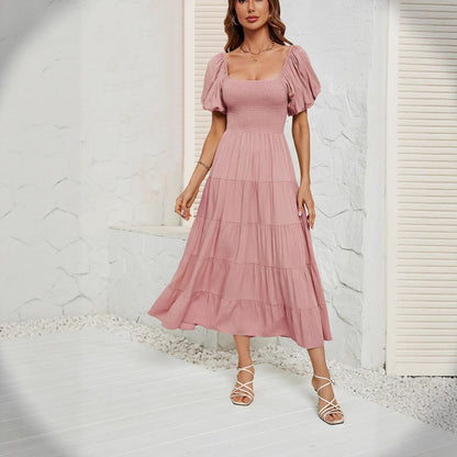 Robe de couleur unie à taille haute et à manches bulles